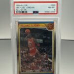 eBay listing photo of 1988 Michael Jordan graded PSA 8 from 1988 Fleer card 120