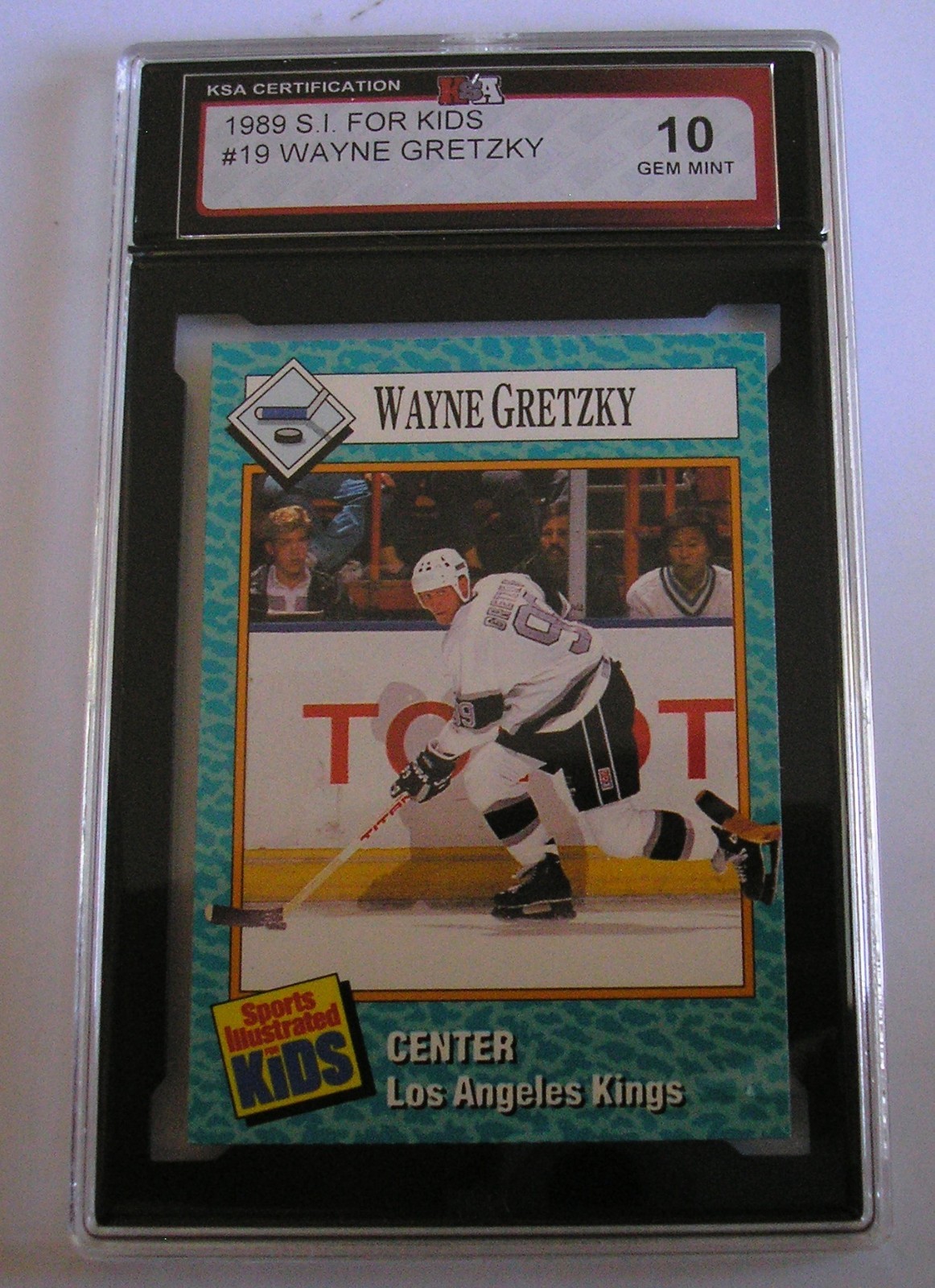 eBay listing photo of 1989 Wayne Gretzky graded K Sportscard Authentication (KSA) 10 from 1989 Sports Illustrated for Kids Series 1 card 19