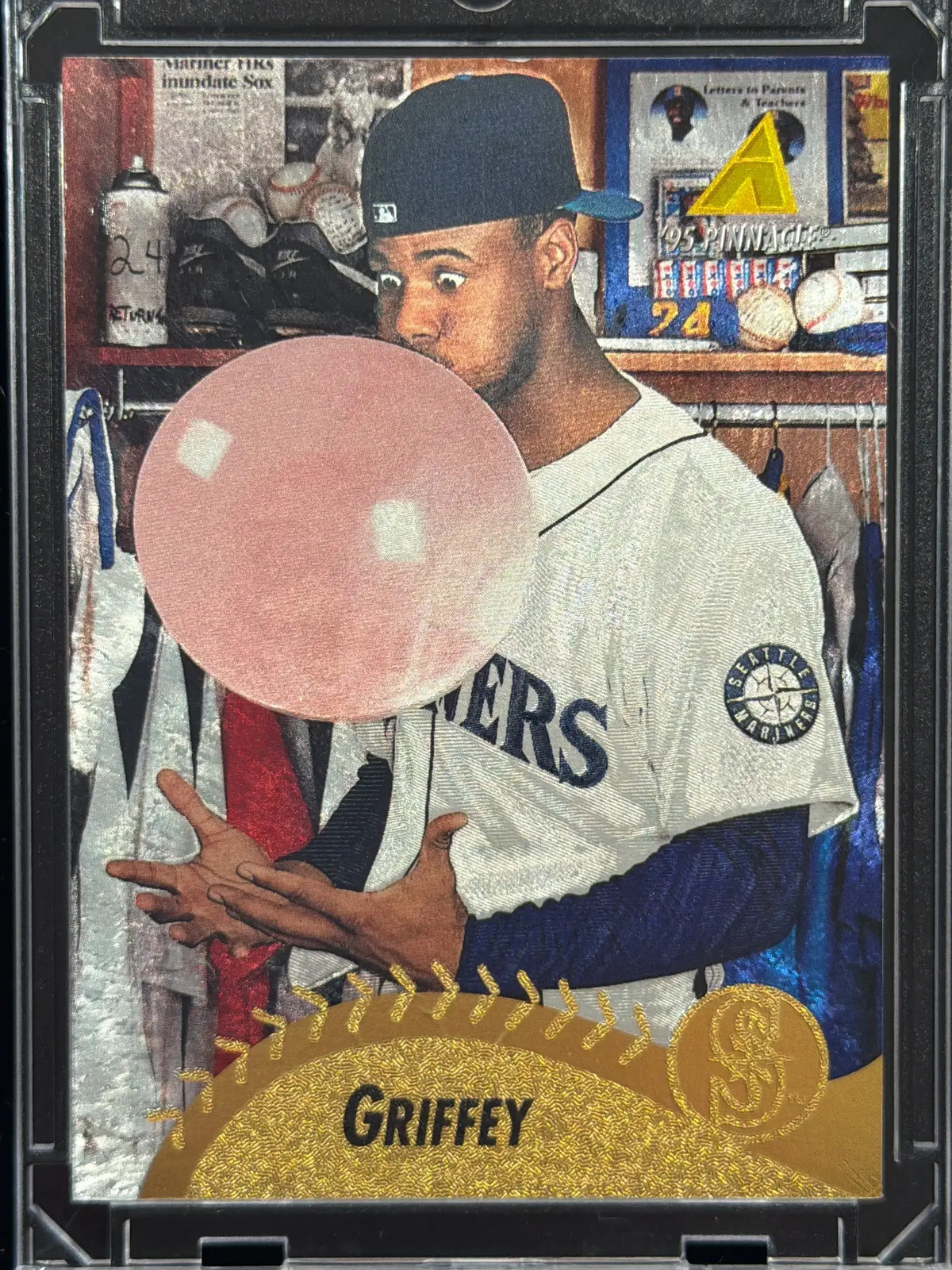 eBay listing photo of 1995 Ken Griffey Jr. ungraded card from 1995 Pinnacle Museum Collection card 128