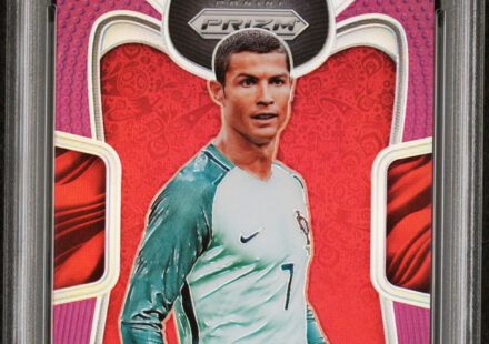 eBay listing photo of 2018 Cristiano Ronaldo graded PSA 9 from 2018 Panini Prizm World Cup card 154